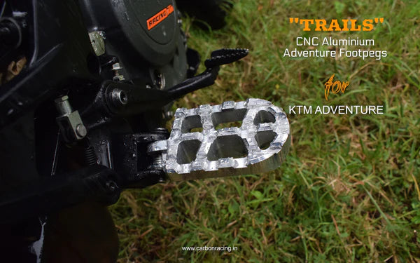 TRAILS- Adventure Footpegs for KTM ADV 390. By Carbon Racing