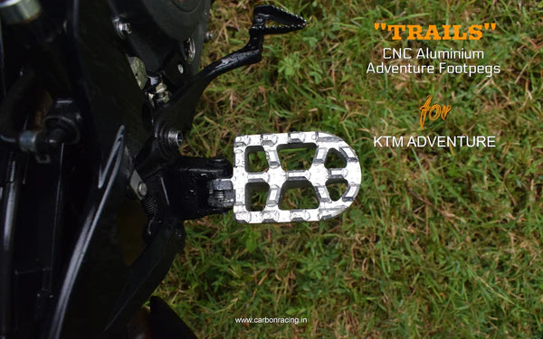 TRAILS- Adventure Footpegs for KTM ADV 390. By Carbon Racing